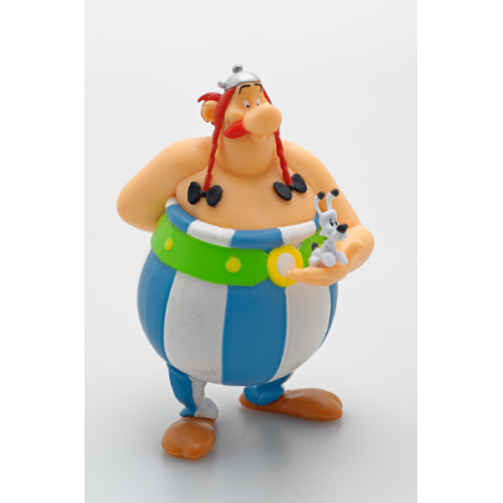 Obelix-Figur und ein buch „Die Galerie der Figuren“